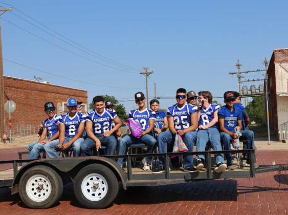 Shown is the Amherst varsity Football Team riding in the 2024 Amherst Summer Celebration Parade that took place Saturday morning. (Photo by Ann Reagan)