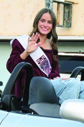 2025 Littlefield Homecoming Queen Candidate, Bryndle Ray rides in the parade on Thursday. (Staff Photo by Derek Lopez)