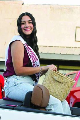 2025 Littlefield Homecoming Queen Candidate, Kami Silveira rides in the parade on Thursday. (Staff Photo by Derek Lopez)