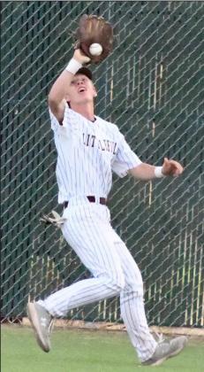 TRACKING THE BALL – Littlefield freshman center fielder, Major McNeese, tracks down a ball in deep center field for an out, during the top of the fourth inning of the Wildcats’, 9-2, victory over Lamesa on Tuesday at Wildcat Field. (Staff Photo by Derek Lopez)