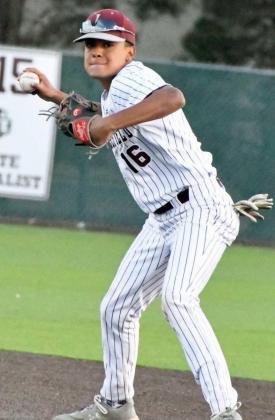 TURNING TWO – Littlefield senior shortstop, Jordan Trevino, takes a flip from Isaiah Rodriguez at second base and fires to first for the double play, during the top of the fifth inning of the Wildcats’, 9-2, victory over Lamesa on Tuesday at Wildcat Field. (Staff Photo by Derek Lopez)