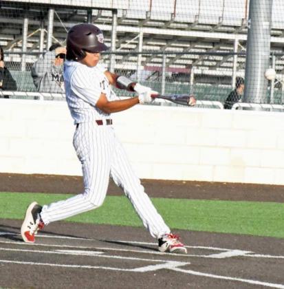 SQUARING UP THE BALL – Littlefield sophomore, Isaiah Rodriguez, hits a shot to left field, during the Wildcats’, 9-2, victory over Lamesa on Tuesday at Wildcat Field. (Staff Photo by Derek Lopez)