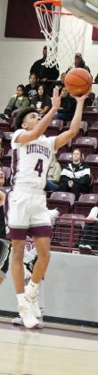 Littlefield junior, Kam McCarty (4), beats the defense for a lay-up, during the second half of the Lady Cats’ victory over Muleshoe on Friday. (Staff Photo by Derek Lopez)