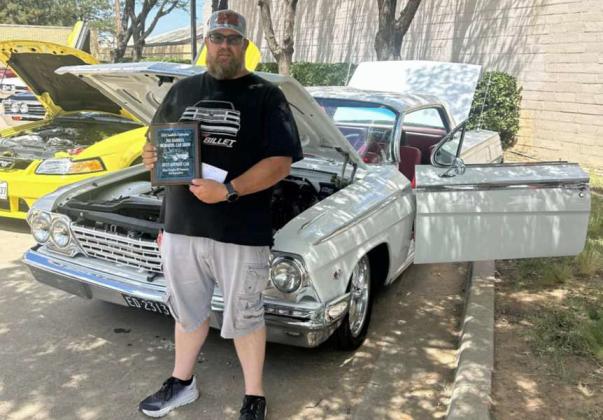 Buddy Holmes and his White Chevy Impala SS won Best Antique Car at the 2025 Joe Harrell Memorial Car Show on Saturday at the 45th Annual Olton Sandhills Celebration. (Submitted Photo)