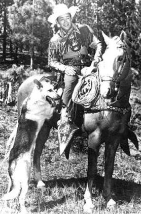 ROY ROGERS, “King of the Cowboys,” w/Trigger and dog Bullet.