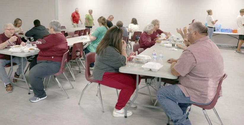 Many patrons at the Junior Class Potato Supper event enjoyed some time to visit before the football game on Friday, October 11, 2024. (Photo by Ann Reagan)