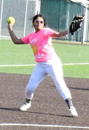 MAKING THE PLAY – Sudan junior, Liz Sital, fields a ball at third base and fires to first for the out against the Littlefield 14u softball team on Thursday during tournament play, the Nettes took the contest, 9-4, to advance to another elimination game against the Littlefield High School team Thursday night. (Staff Photo by Derek Lopez)