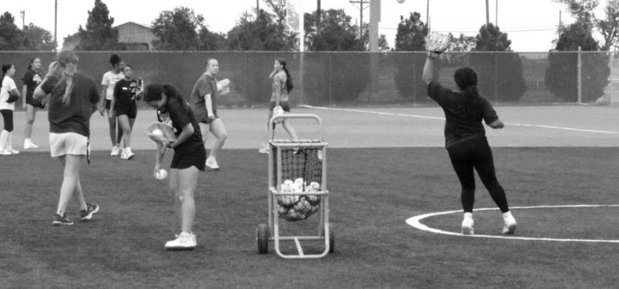 Campers run through drills during the Littlefield Youth Softball Camp on June 18 at the Lady Cat Softball Field in Littlefield.