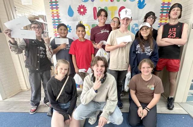 The Lamb County Library hosted a Teen egg hunt event ahead of Easter on April 17, 2025. Pictured are: Korbin Jennings, Aaden Olvera, Max Fernandez, Judah Shea, Esy Patridge, Caleb Shea, Millie Sanchez, Kaden Thomas, Jaxon Jennings, Jonny Shea, Allison Stamps and Shiloh Shea. (Photo by Madison Vidales)