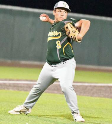 Springlake-Earth’s Braden Bradley comes off of the mound and fields a ball on the left side, throwing it to first for an out, during their, 144, loss to Crosbyton on Thursday in Littlefield. (Staff Photo by Derek Lopez)