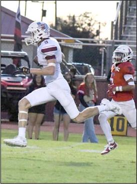 INTO THE OPEN FIELD - Littlefield tailback, Sam Hill, braeks free for a long touchdown run up the middle, during the first half of the Wildcats road victory last Friday to close out the pre-district schedule. (Staff Photo by Derek Lopez)