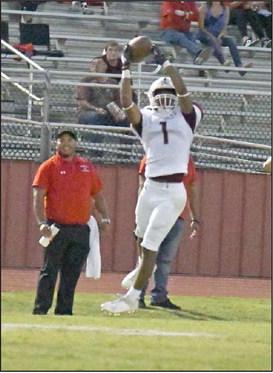 MOVING THE CHAINS - Littlefield senior receiver, MJ Randle, leaps up for a catch and gets some solid yardage after the catch, during the Wildcats road victory last Friday to close out the pre-district schedule. (Staff Photo by Derek Lopez)