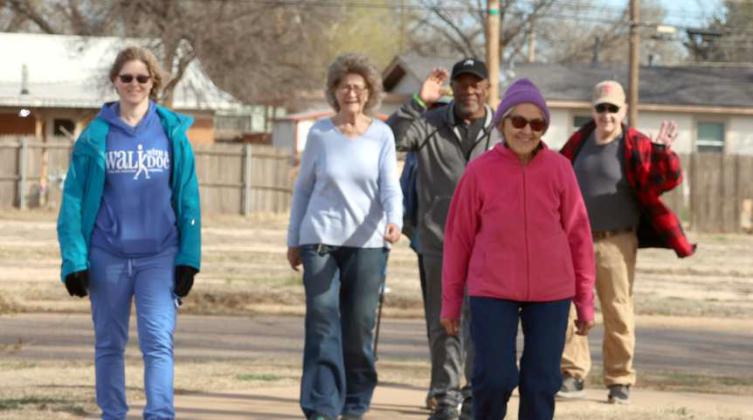 Dr. Gagnon Of Lamb Healthcare Family Medicine on the left starts her group on their walk around Crescent Park in Littlefield on Saturday, March2,2024. (Photo by Ann Reagan)