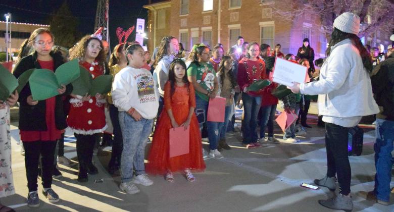 LITTLEFIELD ELEMENTARY students sing at the Christmas Parade that took place in Littlefield. (Photo by Ann Reagan)