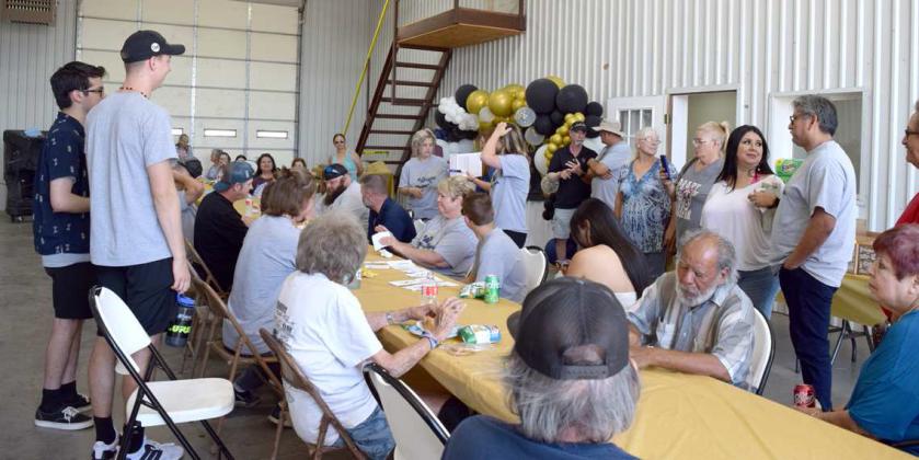 A large crowd attended the 50th Anniversary Celebration of Wrights Collision Center on Saturday, July 22,2023. Some guests were come and go while others stayed for the hot dog eating contest, door prize drawings, and the live band performance by “Clock Struck 9”. (Photo by Ann Reagan)
