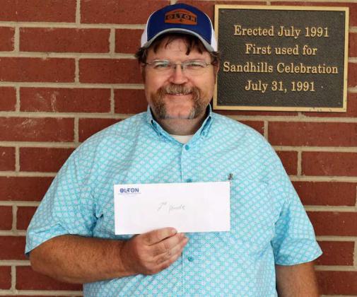 WB Dickinson Parade Photos were judged by KAMC’s Lauren Matter (not pictured). The Olton High School Class of 1989 won second prize for their entry into the parade and they were represented in this picture by Stan Young (Photo by Wesley Quigley)
