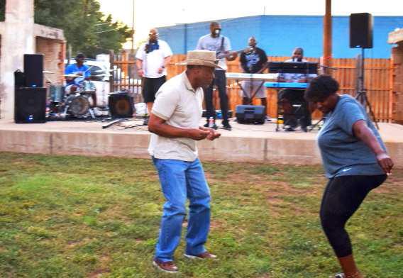 left to right-Johnny Rosemond and Sharon Johnson kick off the Flatland Street Dance in the Palace Park, downtown Littlefield on Friday, July 14, 2023. (Photo by Ann Reagan)