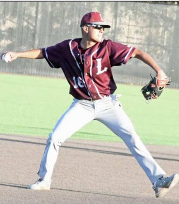 OUT AT FIRST – Littlefield senior shortstop, Jordan Trevino, field a grounder and throws to first for an out, during the Wildcats, 6-5 loss to Lamesa in their first meeting of district play on Friday. (Staff Photo by Derek Lopez)