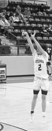 Littlefield’s Andrew Davis (2), buries a three from the top of the key, during the first half of the Wildcats’ win Tuesday night. (Staff Photo by Derek Lopez)
