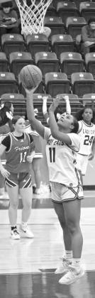 Littlefield’s Nia Cleveland (11), drops in a lay-up, during the first half of the Lady Cats’ win Tuesday night. (Staff Photo by Derek Lopez)