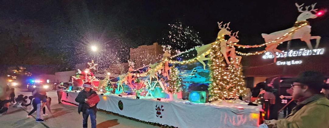 SANTA AND HIS SLEIGH CLOSED out the Lighted Christmas Parade in Littlefield on Friday, Dec. 15. (Staff Photo by Derek Lopez)