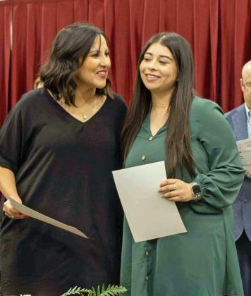 Chloe Diaz receives the $2,000 Hispanic Association of Women Scholarship at the Littlefield High School Scholarship Awards Ceremony on May 20, 2025. Diaz additionally received the Richard Thompson Memorial Scholarship for $500 and the $8,000 Rotary Club Scholarship. (Staff Photo by Madison Vidales)