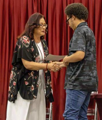 Trent Tisdale receives the Austin’s Army Memorial Scholarship for $500 at the Littlefield High School Scholarship Awards Ceremony on May 20, 2025. Tisdale additionally received a $1,000 scholarship from Food King. (Staff Photo by Madison Vidales)