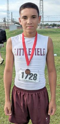 RUNNING HARD - Littlefield’s Sammy Saenz finished 11th overall in the boy’s junior high race, to help the Wildcats to a seventh place team finish at the Oil Patch Invitational in Sundown last weekend. (Submitted Photo)