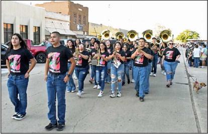 The Littlefield Marchin’ Cats Band marched during the 2023 Littlefield Homecoming Parade on Thursday. (Staff Photo by Derek Lopez)