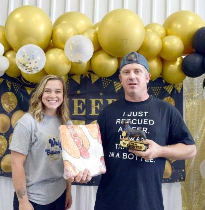 The “Wiener” trophy is awarded to Ricky Motsenbocker first place for eating ten hot dogs during the Hot Dog Eating Contest at the 50th Anniversary Celebration for Wrights Collision Center on Saturday, July 22,2023. (Photo by Ann Reagan)
