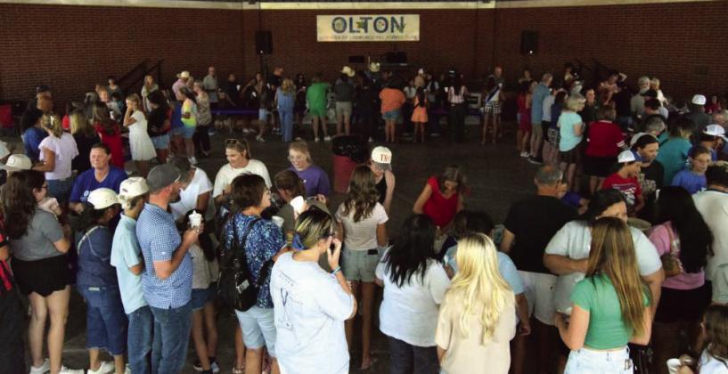 Attendees enjoy homemade ice cream at the Annual Chris Jones Ice Cream Social &amp;amp; Contest during the 2026 Sandhills Celebration on July 29. (Photo by Leon Szaniszlo)