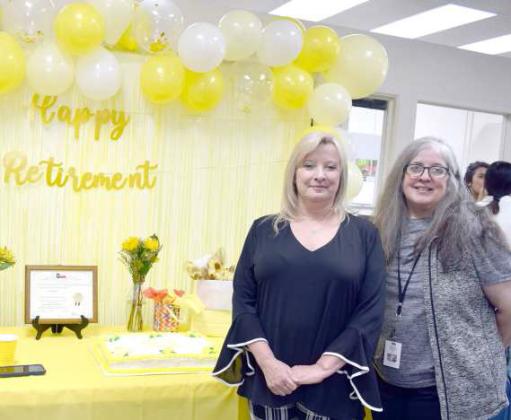 Carrie Barden (left) with Lamb County Administrative Assistance an friend Terri Hanna (right) at the Lamb County Family Resource Center in Littlefield, Tx on the occasion of Carrie Barden’s retirement after 40 years of service on Thursday, August 24, 2023. (Photo by Ann Reagan)