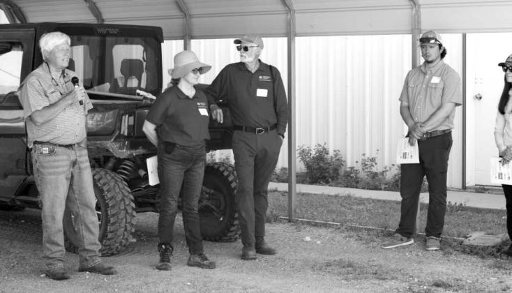 Isabel Vales, associate professor in the Texas A&amp;amp;M Department of Horticultural Sciences, and Bruce Barrett of Barrett Potato Farms provide updates on the potato breeding program during the Texas Potato Field Day on July 22 in Springlake, Texas. (Photo by Leon Szaniszlo)