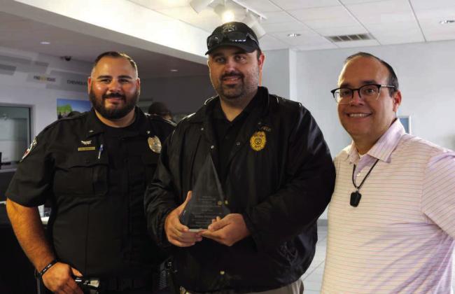 Littlefield Police Chief Samuel Garcia, Detective Steve Dekraker- First Responder of the year, and Rick Martinez of Premier Chevrolet GMC in Littlefield, Texas during the First Responders Appreciation Luncheon honoring all the first responders of Littlefield on Tuesday, October 7, 2025. (Photo by Ann Reagan)