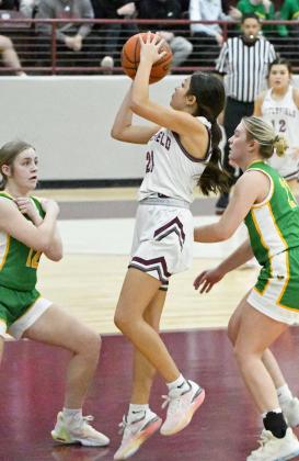 Littlefield senior, Ari Castillo (20), gets into the paint for a lay-up, during the first half of the Lady Cats’ heart-breaking loss to Idalou on Tuesday at Wildcat Gym. (Staff Photo by Derek Lopez)