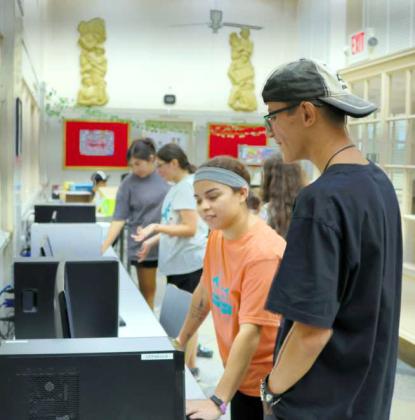 The Fiction Federation for ages 12-15 was also working on their diorama projects at the Lamb County Library on Thursday, July 18, 2024. (Photo by Ann Reagan)