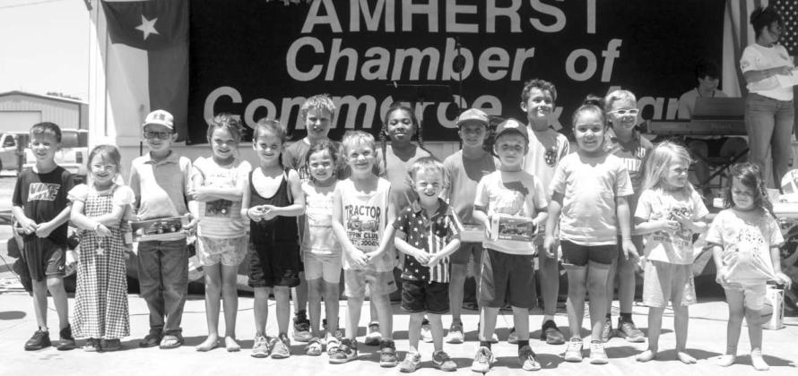 Attendees who competed in the tractor pull competition await results at the annual Amherst celebration on July 25, 2026. For the 3- to 4-year-old competitors, Kera Jones won first place, Berkeley Perkins won second and Job Ames won third. For the 5- to 6-year-old competitors, Barnhardt Klassen won first place, Jayten Bigham won second and Kadence Rogers won third. For the 7- to 8-year-old competitors, Ky Bartley won first place, Mateo Holguin won second and Kobe Jones won third. (Photo by Madison Vidales)