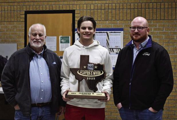 Sudan senior quarterback, Caleb Groetken was named the Week 10 Built Ford Tough Texas High School Football Player of the Week in class 2A. In week 10, Groetken finished the game with 222 passing yards and three touchdowns, 120 rushing yards and three touchdowns and he was 8-8 on extra points and had a 70-yard punt. Groetken will be honored at a banquet on January 10th at the Frisco Star. Shown are Randy Rogers and Josh Terry of Smith Ford in Levelland presenting Groetken with his trophy. (Submitted Photo)