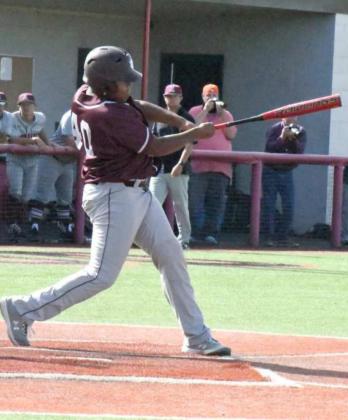 OFF THE FENCE – Littlefield’s Jonavan Weaver blasted a shot off of the left-field fence in the bottom of the fourth inning of the Wildcat’s, 11-3, Area Play-off victory over Abernathy on Friday at Lubbock-Cooper High School. (Staff Photo by Derek Lopez)