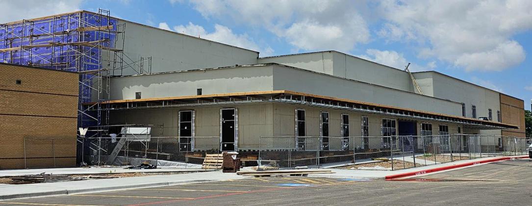Construction continued on the new Littlefield High School Friday afternoon. Crews are working on bricking the front and east side of the building. Windows have been installed on the first level and are begining installment on the second level as well. (Staff Photo by Derek Lopez)