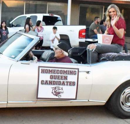 2022 Littlefield Homecoming Queen candidate, Madison McNeese, riding in the Homecoming Parade on Thursday down Phelps Ave. (Staff Photo by Derek Lopez)