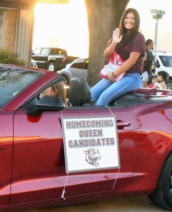 2022 Littlefield Homecoming Queen candidate, Madalyn Tarango, riding in the Homecoming Parade on Thursday down Phelps Ave. (Staff Photo by Derek Lopez)
