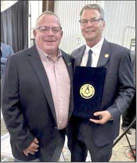 HPWD Vice-President /Precinct 2 Director Brad Heffington, left, pictured with Sen. Charles Perry, right pictured together at a ceremony at SIMFLO’s Engineering Products Facility. (Submitted Photo)