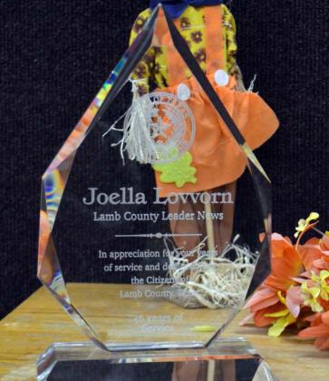 JOELLA LOVVORN, long time Lamb County Leader News employee, was presented with an award in appreciation for her 46 years of service, by Lamb County Judge James M. DeLoach. Lovvorn was not present to accept her award. (Staff Photo by Samantha Pontius)