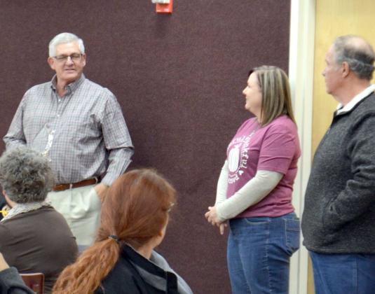 DISTRICT JUDGE Felix Klein is retiring and was recognized for his years of service, by Lamb County Judge James M. DeLoach, with an award at the County Thanksgiving Luncheon that was held at First Baptist Church in Littlefield on Friday. (Staff Photo by Samantha Pontius)
