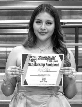 Angela Delgado receives a $500 scholarship from the Lewis Willey Scholarship.
