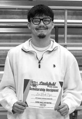 Jose Payan receives a $1,250 scholarship from the SPC Founders Challenge Scholarship.