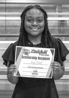 Zamya Darnell receives a $1,250 scholarship from the Patsy Lively Brittain Scholarship.