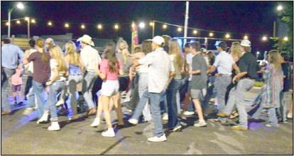 You can’t have a dance in Texas without the Cotton-eyed Joe at the Sudan Harvest Street Dance.