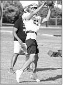 Springlake-Earth’s wide receivers work on their routes and catching passes, during the first week of two-a-days this past week. (Staff Photo by Derek Lopez)